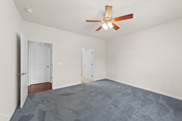 unfurnished bedroom with ceiling fan and carpet floors