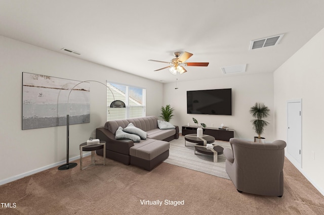 living room with carpet and ceiling fan