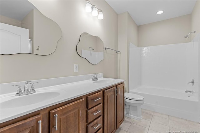 full bathroom featuring shower / bathing tub combination, vanity, toilet, and tile patterned floors