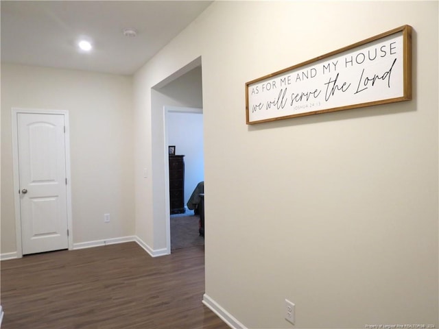 corridor featuring dark hardwood / wood-style floors