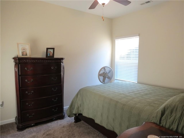 bedroom with ceiling fan and carpet