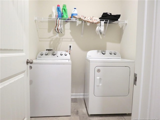 laundry room with washer and clothes dryer