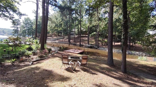 view of yard featuring a water view