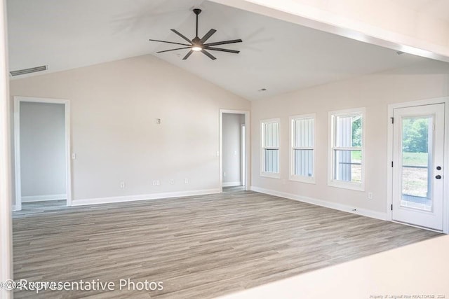 interior space with ceiling fan, light hardwood / wood-style flooring, and lofted ceiling