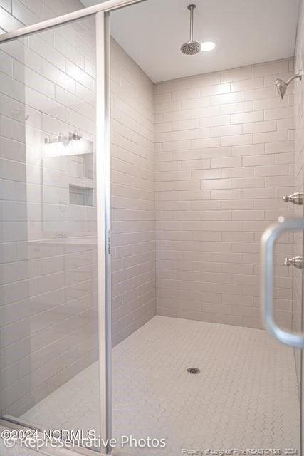 bathroom featuring walk in shower