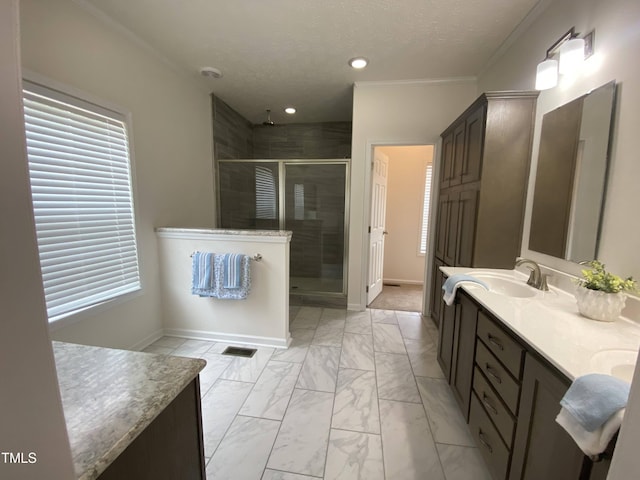 6733 Oscar Barham Rd, Wake Forest, NC 27587 - bathroom with marble look tile flooring, a stall shower, double vanity, baseboards, and ornamental molding