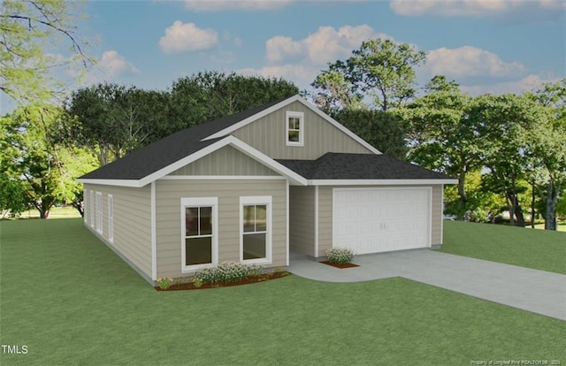 view of front facade with a front yard and a garage