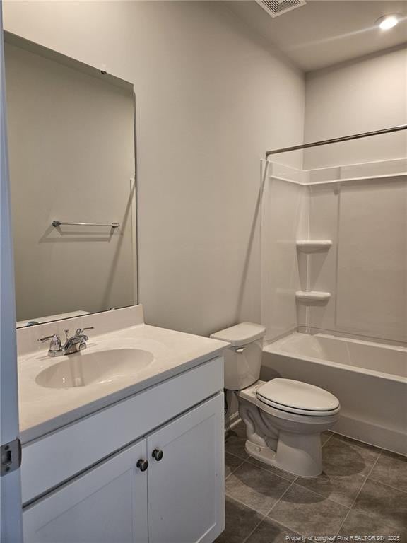 full bath featuring toilet, vanity, shower / bathing tub combination, and tile patterned flooring