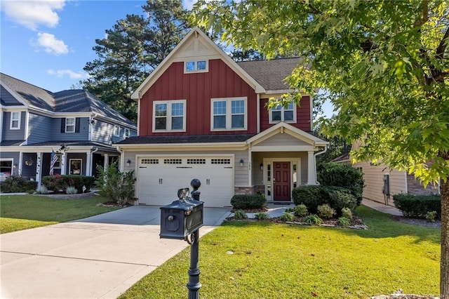 craftsman-style house featuring a garage and a front lawn