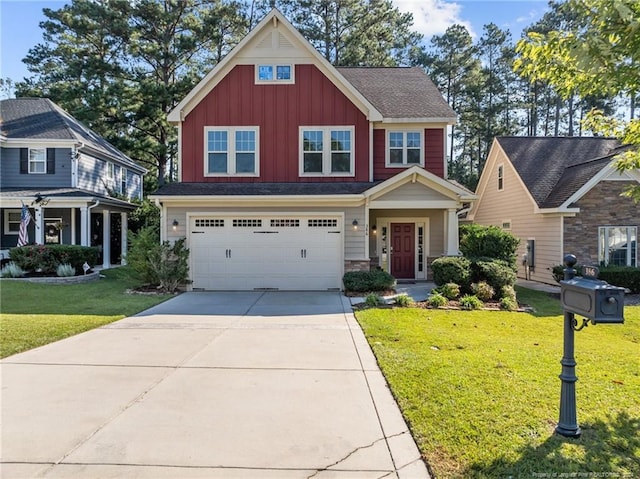 craftsman-style home featuring a garage and a front lawn