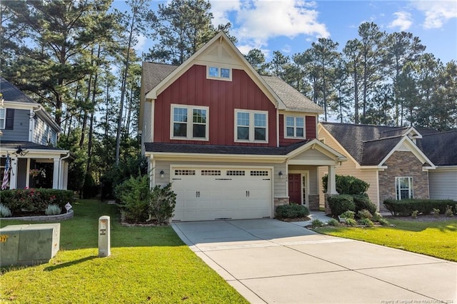 craftsman inspired home featuring a front yard and a garage