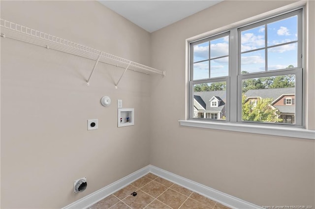 laundry area featuring washer hookup, gas dryer hookup, tile patterned flooring, and hookup for an electric dryer