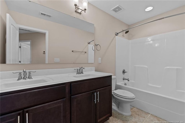 full bathroom featuring shower / tub combination, vanity, toilet, and tile patterned floors