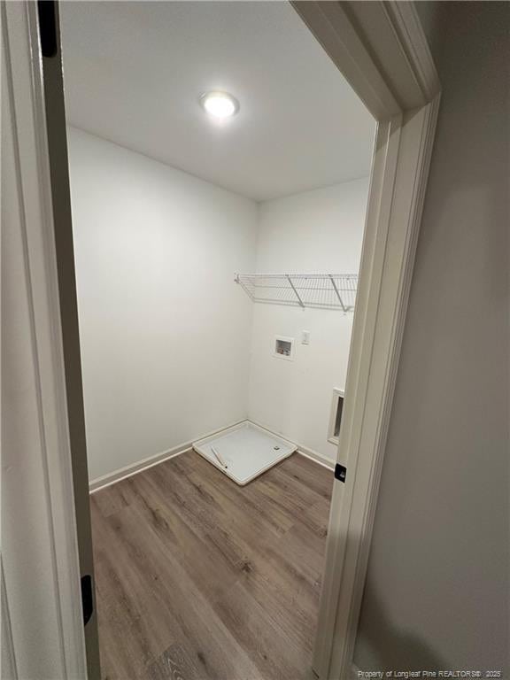 clothes washing area with washer hookup and hardwood / wood-style flooring