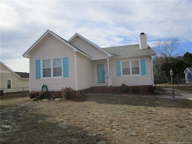 view of front of property with a front lawn