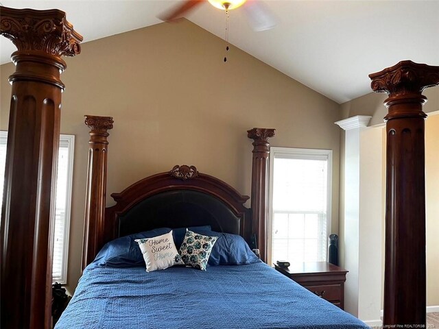 bedroom with ceiling fan and lofted ceiling