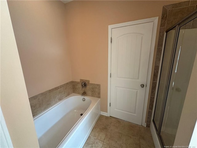 bathroom featuring tile patterned floors and plus walk in shower