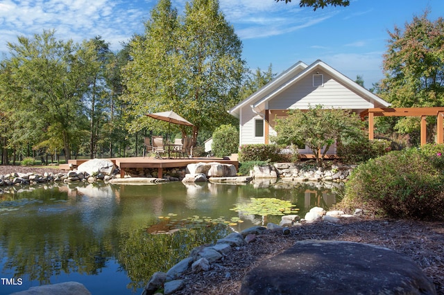 view of home's community featuring a water view