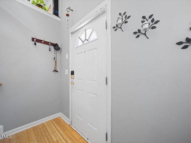 foyer entrance featuring hardwood / wood-style floors