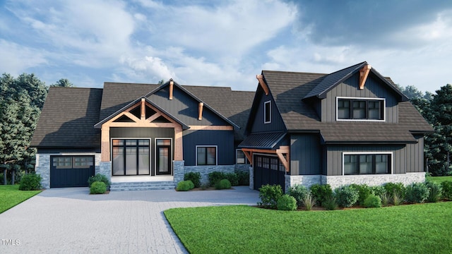 craftsman inspired home featuring a garage and a front lawn