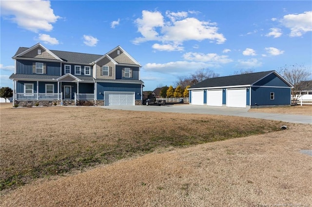 view of front of house with a porch and a front yard