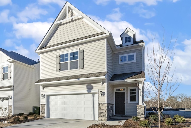 craftsman-style home with a garage