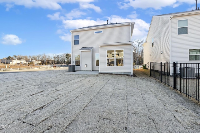 rear view of house featuring a patio