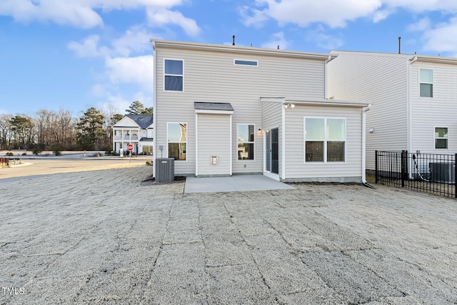 back of house featuring a patio and central AC