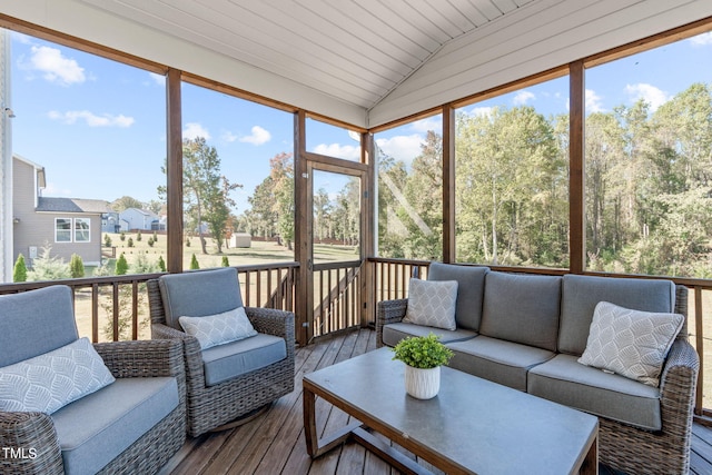 sunroom with vaulted ceiling