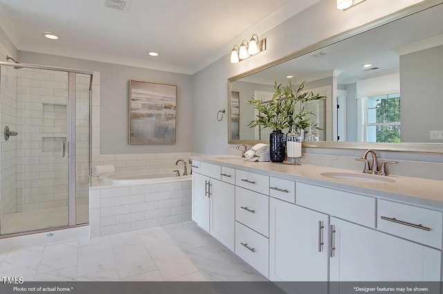 bathroom with shower with separate bathtub and vanity