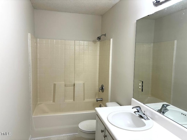 full bathroom with vanity, a textured ceiling, toilet, and  shower combination