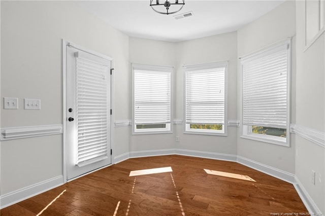 interior space with hardwood / wood-style floors