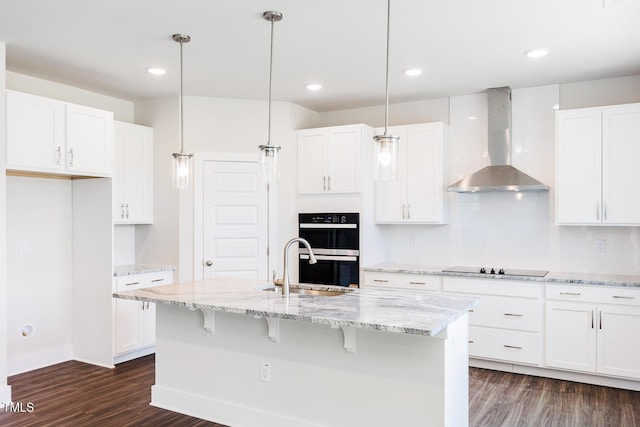 456 Barbour Farm Ln, Four Oaks, NC 27524 - kitchen featuring wall chimney exhaust hood, dark wood finished floors, a sink, double oven, and white cabinets