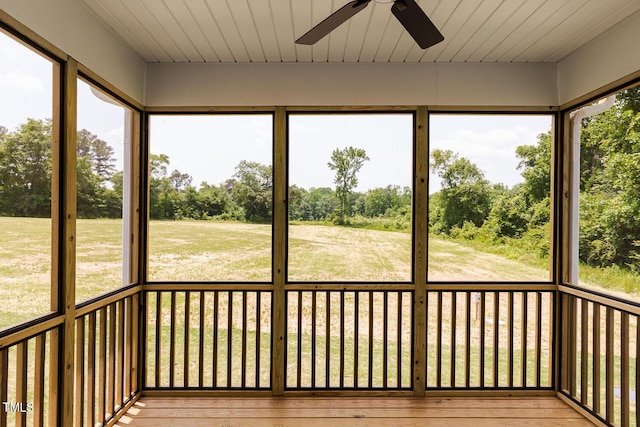 456 Barbour Farm Ln, Four Oaks, NC 27524 - unfurnished sunroom with ceiling fan, healthy amount of natural light, and view of scattered trees