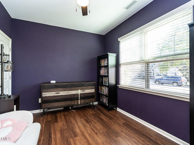 bedroom featuring ceiling fan and dark hardwood / wood-style floors