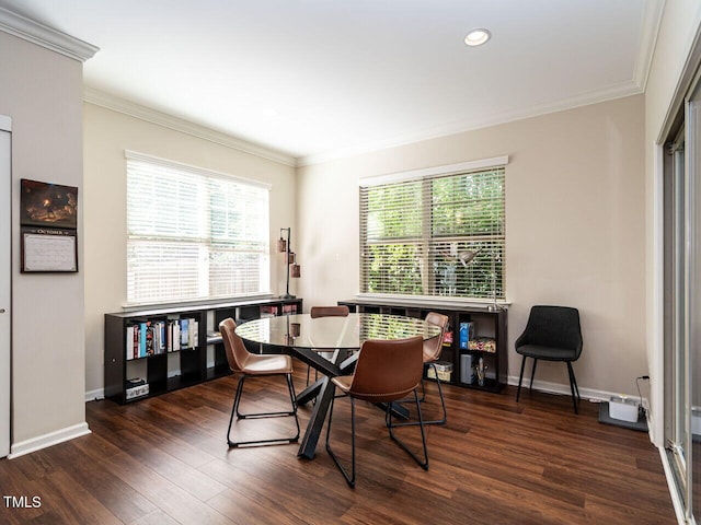 dining room featuring crown molding and dark wood-type flooring