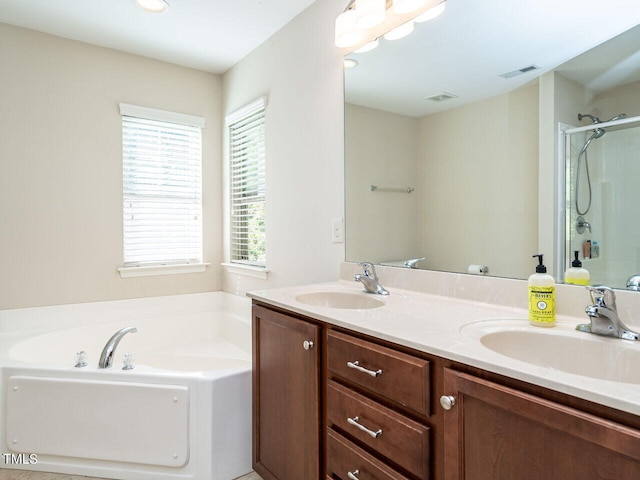 bathroom featuring vanity and plus walk in shower