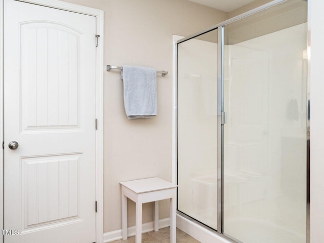 bathroom featuring an enclosed shower