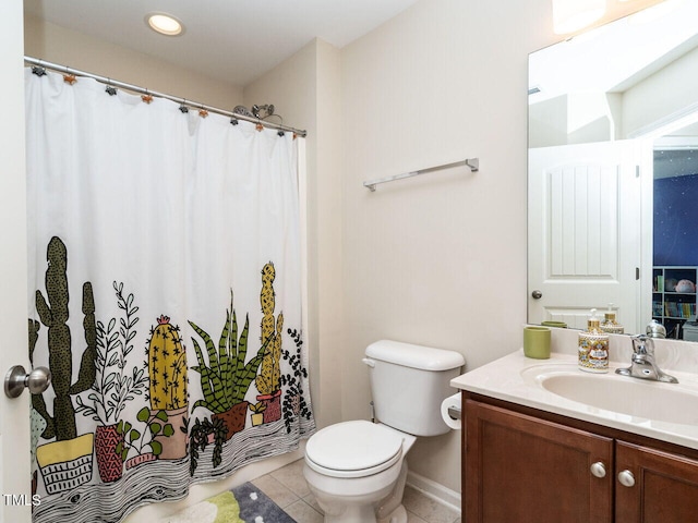 bathroom with tile patterned floors, vanity, toilet, and curtained shower