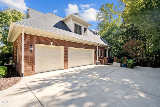 view of property exterior featuring a garage