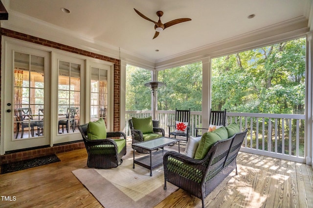 sunroom / solarium with ceiling fan