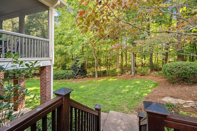 view of yard with a sunroom