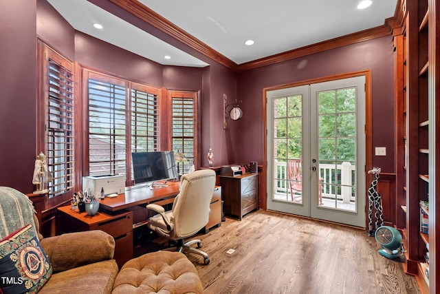 office area featuring french doors, crown molding, and light hardwood / wood-style flooring