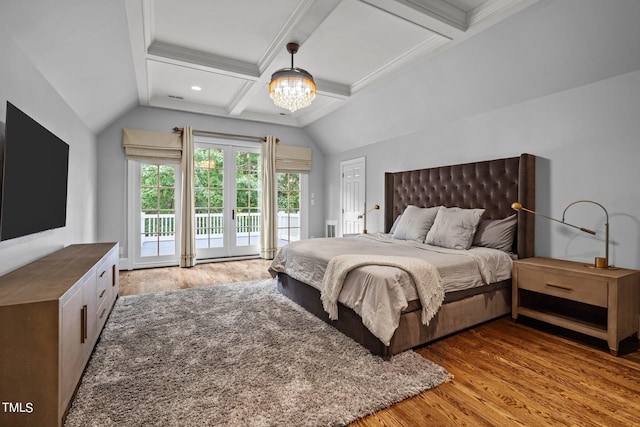 bedroom featuring a notable chandelier, hardwood / wood-style floors, access to exterior, and beamed ceiling