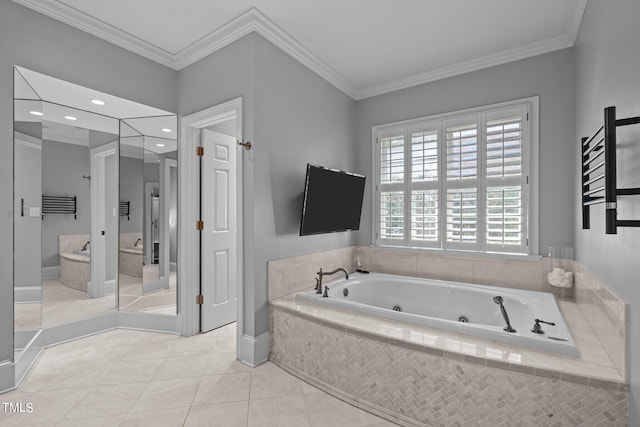 bathroom with ornamental molding, tiled tub, and tile patterned flooring