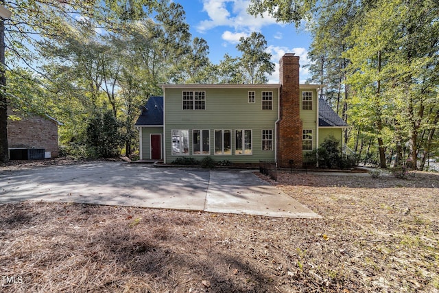 back of house featuring a patio