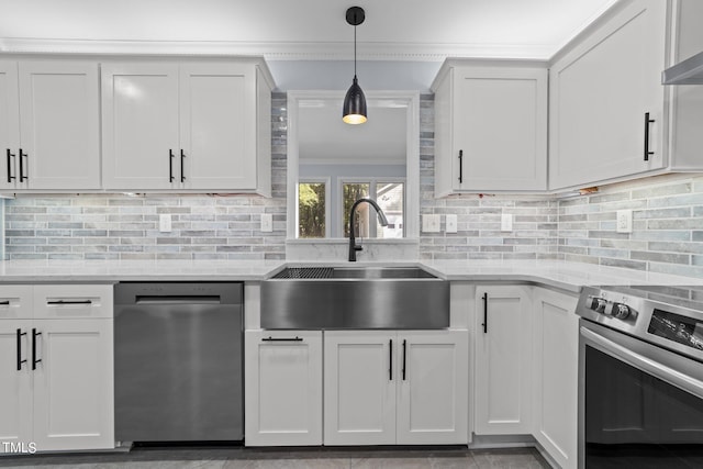 kitchen featuring stainless steel appliances, sink, and white cabinetry