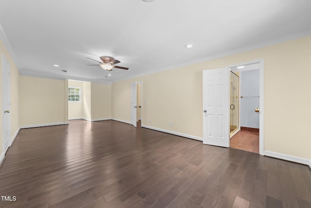 empty room featuring crown molding, ceiling fan, and dark hardwood / wood-style floors