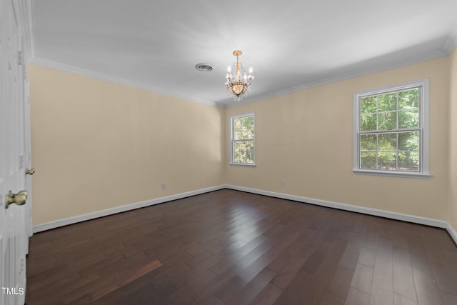 unfurnished room featuring a notable chandelier, crown molding, and dark wood-type flooring