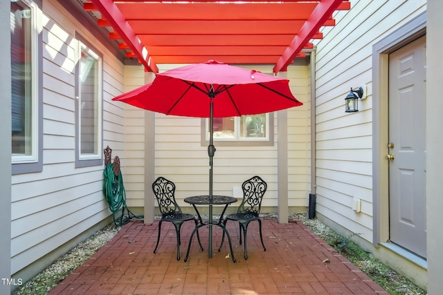 view of patio featuring a pergola
